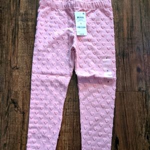 Pink heart patterned leggings - size 5